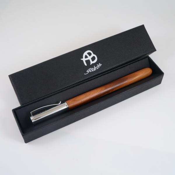 Rollerpen aus Zwetschkenholz mit Metallkappe
